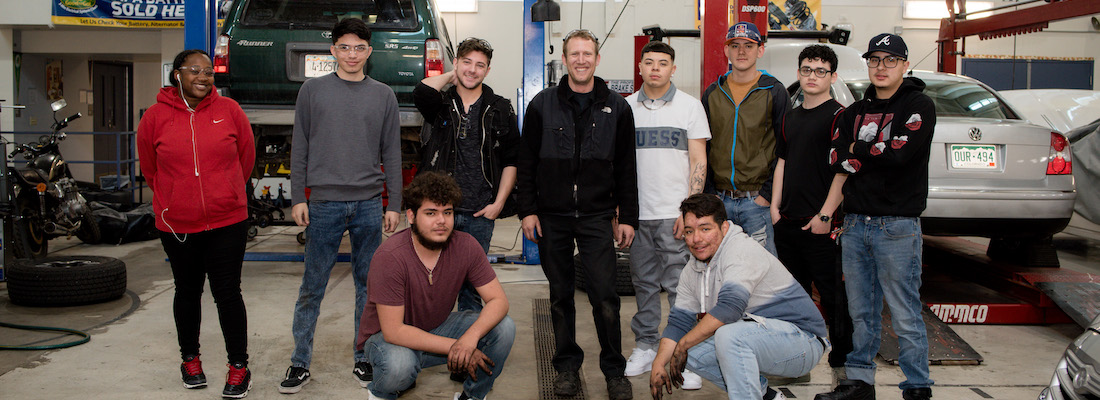 Class of automotive students posing